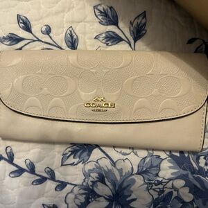 Coach Beige Embossed Clutch
